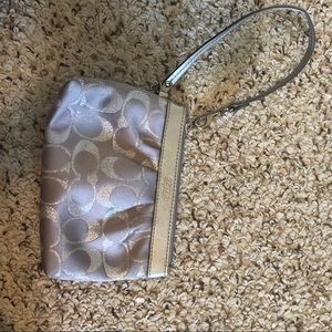 Gray/silver Coach wristlet